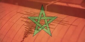 Estrella verde de la bandera de Marruecos sobre el trazo rojo de un sismógrafo